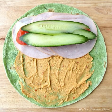 turkey wrap - hummus, cucumber, tomato and turkey on spinach wrap Hummus Cucumber, Spinach Wrap, Turkey Wrap, Turkey Wraps, Spinach Wraps, Healthy Turkey, Cucumber Tomato, Eat Better, Lunch Snacks