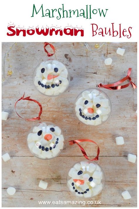 Fun and easy marshmallow filled snowman baubles - Christmas craft idea for kids with video tutorial #EatsAmazing #Christmas #funfood #christmasfood #christmascrafts #snowmen #baubles #kidscrafts #christmaskids #christmasgifts #foodart