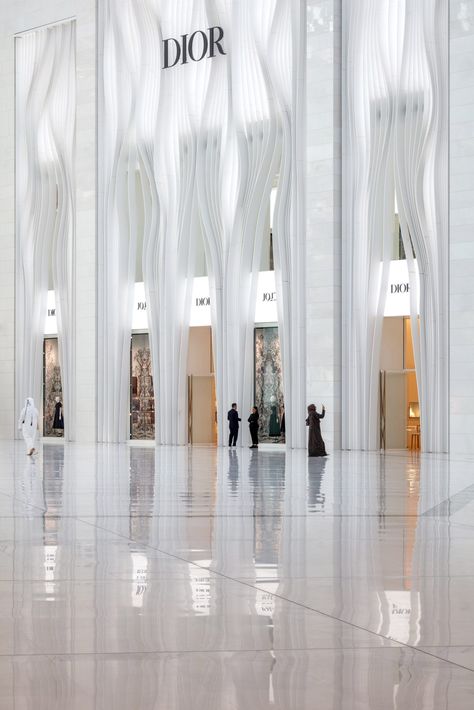 ArandaLasch creates glowing facade with undulating fins for Dior in Qatar Theater Entrance Design, Graduation Proposal, Retail Lighting Design, Dior Pattern, Dior Store, Retail Facade, Architectural Lighting Design, Architectural Materials, Retail Lighting