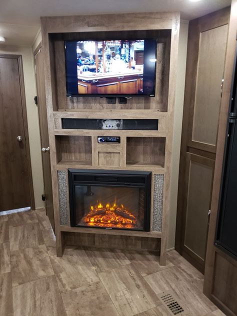 Rv With Fireplace, Camper Entertainment Center Remodel, Camper Fireplace, Rv Fireplace, Trailer Updates, Corner Tv Cabinet, Rv Tv, Rv Living Room, Fireplace And Tv