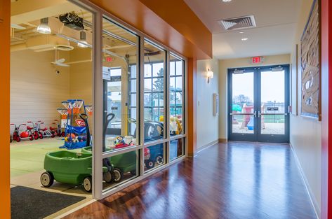 Childcare Facility Design, Daycare Building Design, Childcare Lobby Ideas, Small Daycare Layout, Barndominium Daycare, Daycare Front Entrance Ideas, Daycare Lobby Ideas Reception Areas, Preschool Entryway Ideas, Daycare Entrance Ideas