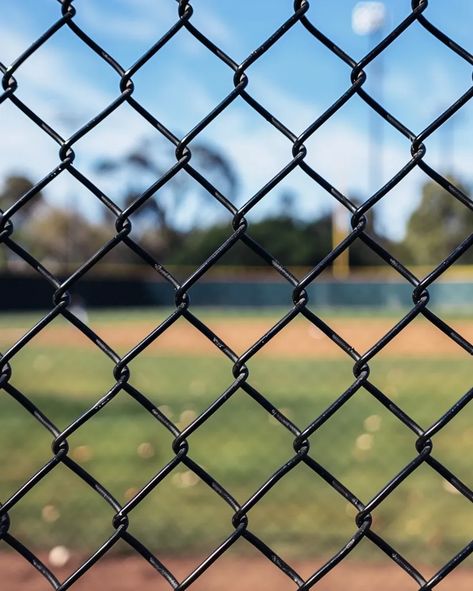 Midjourney AI Image: Closeup of black chain link fence at baseball field, blurred background with home plate and ball pat... → more in ai-img-gen.com Black Chain Link Fence, White Objects, Bold Heels, Home Plate, Chic Sandals, Chain Link Fence, Steal The Spotlight, Cloudy Sky, Blurred Background