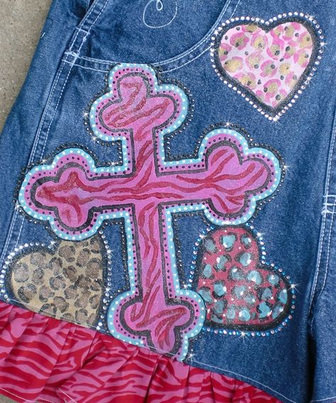 Painted overalls for your child with this design of cheetah hearts and zebra crosses and sweet rosettes and embellished with lots of colorful and clear rhinestone crystals.   I put crystals all around the paintings in pinks, reds, clear and greens. A Super sweet spirited design.  I have painted these a couple different times with a few different elements on them, so you can pick out which parts of the design you like the most. Just send a note in notes to seller with child's name, also  if you would like them around a birthday theme I can do that as well.  I will paint this design custom on size 12m thru 4t overalls. If you should need another size, I can set up another listing for you, prices may vary.  Long overalls or short overalls. (Pictured is shortalls) I have been painting on denim Decorated Overalls, Painted Overalls, Long Overalls, Homecoming Spirit, Painted Shorts, Senior Overalls, School Spirit Wear, Painted Items, Girls Overalls