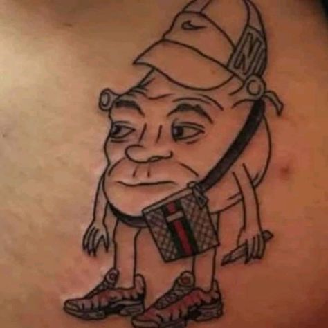 Shrek tattoo Shrek Tattoo, Funny Small Tattoos, Really Bad Tattoos, Tattoo Memes, Tattoo Mistakes, Horrible Tattoos, Mandala Hand Tattoos, Bad Drawings, Wicked Tattoos