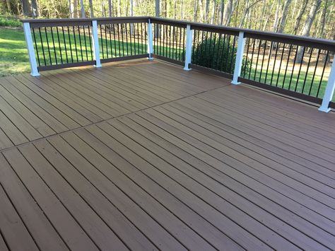 Did the deck today and love the double shade deck paint colors. Behr chocolate on deck with behr white and behr wood chip on railing . Taupe Deck Paint, Deck Painting Ideas Wood, Deck Paint Ideas, Wood Deck Colors, Deck Over Paint, Painted Wood Deck, Stain Deck, Deck Painting, Deck Redo