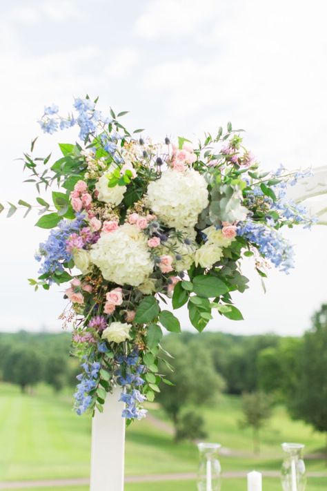 June Wedding Floral Arrangements, Pink White Blue Flowers, Wedding Flower Arrangements Hydrangea, Summer Wedding Arch Ideas, Pastel And Greenery Wedding, Blue And Pink Hydrangea Wedding, Hydrangea Flower Arch, Blue Green White Pink Wedding Flowers, Wedding Floral Arch Outdoor