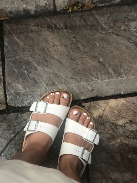 White Arizona Woman birkenstocks pedicure nails White Birkenstock Outfit, Birkenstocks Aesthetic, Arizona Birkenstock Outfit, Birkenstock Aesthetic, Birkenstock Arizona Outfit, Girls Birkenstocks, White Birkenstock, Arizona Birkenstock, Birkenstock White