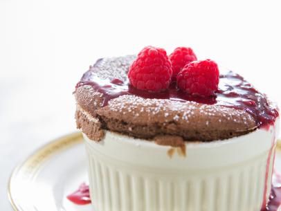 Individual Chocolate Souffles Recipe | Trisha Yearwood | Food Network Raspberry Sauce Recipe, Trisha Yearwood Recipes, Souffle Recipes, Chocolate Souffle, Trisha Yearwood, Southern Kitchen, Raspberry Sauce, Best Comfort Food, Best Dessert Recipes