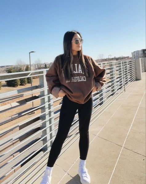 Crew Neck Sweatshirt Outfit Leggings, Cute Tshirt And Leggings Outfit, Black Legging Sweatshirt Outfit, Outfits With Brown Sweatshirts, Brown Sweatshirt Outfit Aesthetic, Chunky Sneakers Leggings Outfit, Oversized Hoodie Outfit With Leggings, Hoodie With Leggings Outfits, Hoodie And Converse Outfit