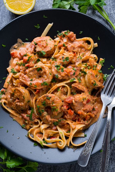 Creamy Cajun Tomato and Garlic Shrimp Pasta Garlic Shrimp Pasta Recipes, Shrimp Tomato, Pasta Shrimp, Cajun Shrimp Recipes, Garlic Shrimp Pasta, Shrimp Recipes For Dinner, Easy Chicken Dinner Recipes, Creamy Tomato Sauce, Cajun Shrimp