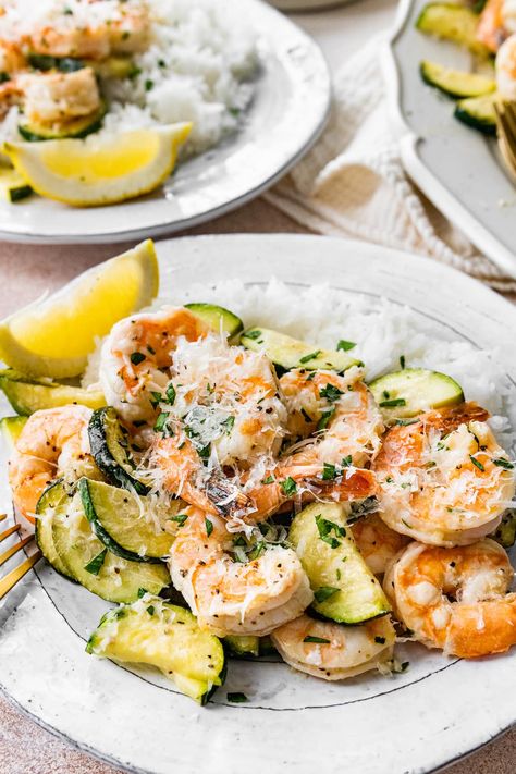 This easy shrimp scampi sheet pan meal combines shrimp and zucchini tossed in a light lemon garlic sauce. It comes together in under 20 minutes so is the perfect recipe for busy weeknights! Shrimp Zucchini Recipes, Shrimp And Zucchini, Shrimp Zucchini, Easy Shrimp Scampi, Lemon Garlic Sauce, Lemon Shrimp, Lemon Garlic Shrimp, Pan Dinners, Pescatarian Recipes