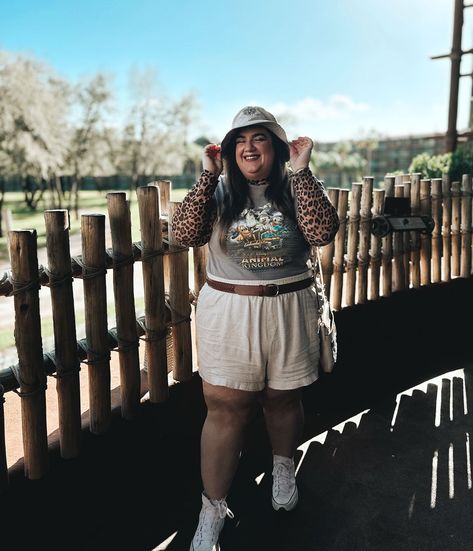 Last week, I channeled my inner explorer at Animal Kingdom Lodge! 🐘🌿 I was totally feeling the safari vibes in my @disneyparks Mickey & friends tee, bucket hat, and linen shorts—ready to spot all the animals and soak up the wild side of Disney magic. 🦒✨ Hat: thrifted Tee: Mercari Long Sleeve: @torrid Shorts: @torrid Belt: @torrid Shoes: @converse Bag: @coach #OnSafari #animalkingdom #safari #disneysafari #disneystyle #plussize #plussizefashion #disneyplussize Converse Bag, Disney Bounds, Animal Kingdom Lodge, Magic Hat, Friends Tee, Torrid Shoes, Shoes Converse, Disney S, The Animals