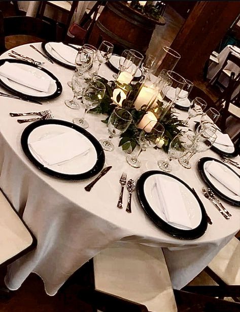 Table Setting With Black Chargers, Wedding Black Charger Plates, Black Wedding Chargers, Black Charger Table Setting, Eucalyptus And Black Table Decor, White Plates Black Silverware Table Setting, Black Charger White Plate, Black Charger Plates Wedding Table Settings, Black Wedding Dinner Table