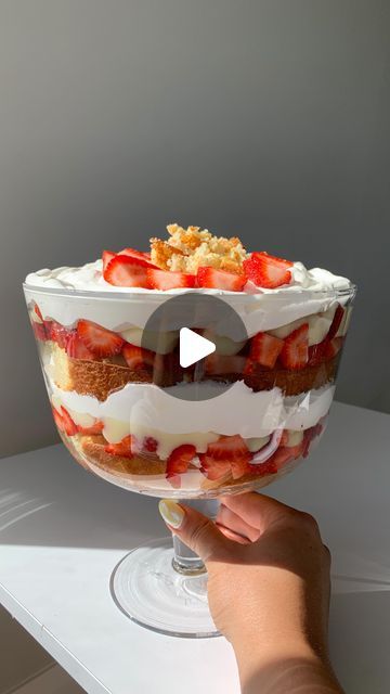 Melissa Ibrahim on Instagram: "🍓 Strawberry Shortcake Trifle 🍰  Happy Canada Day! Here’s what I’m bringing with me to a pool party! Enjoy the beautiful day & stay safe friends!   Here’s what you need: 1 box vanilla cake mix, prepared @bettycrocker  3/4 container of @coolwhip  1 large package of instant vanilla @jello pudding mix, prepared  Fresh strawberries - I used two packs chopped   Layer as shown in the video! Enjoy ❤️🤍  #happycanadaday #canadaday #strawberry #strawberries #trilife #trifle #triflecake #strawberryshortcake #desserts #recipeshare #explore #holiday #potluck #cake #shortcake #sweettooth #yum #tasty #tastytreats" Strawberry Trifle Recipes, Potluck Cake, Jello Pudding Desserts, Shortcake Trifle, Vanilla Jello, Trifle Recipes Easy, Strawberry Shortcake Trifle, Trifle Dessert Recipes, Holiday Potluck