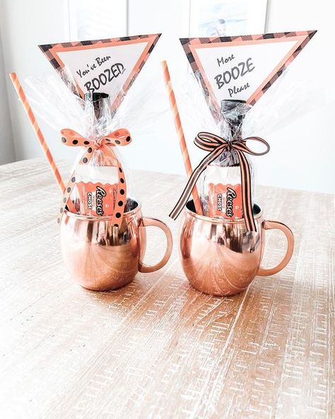 Megan | Alabama on Instagram: "I thought I would start the season off with something that’s surprisingly not for kids but for mom and dad! I’m a big fan of “booze” baskets for neighbors, friends, family or your spouse! These were so fun to make, one for me and one for my hubbs 🥰 I grabbed these copper mugs in a two pack from home goods and stuffed them with our favorite candy and half a bottle of red. CHEERS! Let the spooky season begin! Everything is linked on my LTK! . . . . . . . . . . . Adult Halloween Party Favors, You've Been Boozed, Halloween Craft Kits, Boo Baskets, Spooky Candy, Halloween Gift Baskets, Spooky Snacks, Halloween Movie Night, Pumpkin Spice Candle