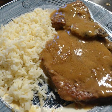 This recipe is very similar tasting to the country style steak at K&W Cafeteria style restaurants. I use Uncle Ben's boil in bag rice with this as it tastes almost the same as K&W, but mine may be a little better, if I do say so myself!  ;) Country Style Steak And Gravy, Steak Oven, Country Style Steak, Steak Gravy, Cube Steaks, Steak And Gravy, Cube Steak And Gravy, Cubed Steak, Cube Steak Recipes