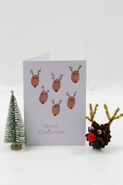 Fingerprint Christmas Cards - Reindeer fingerprint Christmas cards - a perfect Christmas craft for kids Kids Craft Christmas Cards, Reindeer Fingerprint, Fingerprint Christmas Cards, Christmas Cards Handmade Kids, Fingerprint Christmas, Christmas Card Ideas, Reindeer Card, Christmas Cards Kids, Homemade Christmas Cards