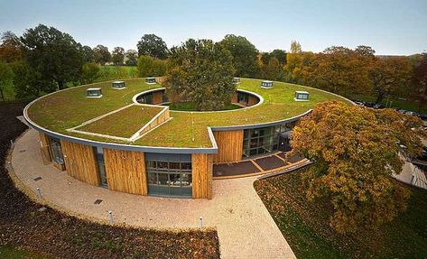 Celebrating America’s Greenest & LEED Certified Buildings. | elephant journal Case Sotterranee, Eco Roof, Sedum Roof, Green Roof System, Grass Roof, Round Building, Earth Sheltered, Living Roofs, Underground Homes