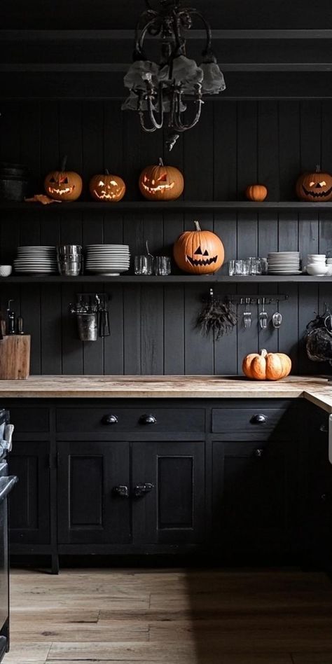 Transform your home with minimalist Halloween decor that captures the spirit of the season. Focus on clean lines and simple shapes, using black silhouettes of bats, cats, and witches against white walls. Incorporate natural elements like bare branches in sleek vases or a single, statement pumpkin. Embrace the power of repetition with rows of identical candles or neatly arranged miniature skulls. This refined approach to Halloween decor creates a hauntingly beautiful atmosphere without clutter, a Minimalist Halloween Decor, Minimalist Decor Ideas, Minimalist Halloween, Chic Halloween, Hauntingly Beautiful, Black Silhouette, Natural Elements, Minimalist Decor, Simple Shapes