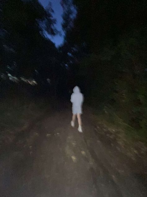 Dark woods - boy walking alone in blue shorts and blue hoodie- flash on Walking In The Dark, Walking Road, Night Walks, Dark Street, Alone In The Dark, Walking Street, Film Studies, Playlist Covers, Walk This Way