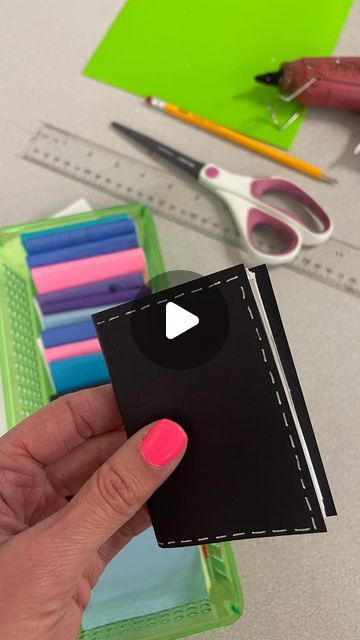 Kristen Bourdier on Instagram: "Making a tiny sketchbook part 1! Art 2 is going to be carving erasers to create stamps so we just had to make tiny sketchbooks for them! Each student will collect their classmates’ stamps in this little tiny book. 😍 following @cassie_stephenz beginning steps for making a tiny sketchbook I used 90lb drawing paper (9x12), a pencil, scissors, colored construction paper (3x5), and hot glue. More steps in my next reel as well as an option for securing the pages before adding the cover.  . . . #tinysketchbook #stampbook #stampcollection #miniature #minibook #tinybook #asmr #asmrvideo #asmrcutting #asmrart #asmrpaper #artteacher #middleschoolart #middleschoolartteacher #middleschoolartlessons #diybook #handmadebook #tinyart #miniart #miniatureart #pocketsized" Tiny Stamp Carving, Thing To Draw In Sketchbook, Tiny Sketchbook Ideas, How To Make A Book Out Of Paper, How To Make A Sketchbook, How To Make A Mini Book, Tiny Book Covers, Diy Sketchbook, Tiny Sketchbook