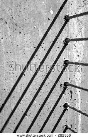 Detail of high tension steel cables protection railing embedded in concrete with diagonal shadows Hometalk Diy, High Tension, Railing, Slime, Home Diy