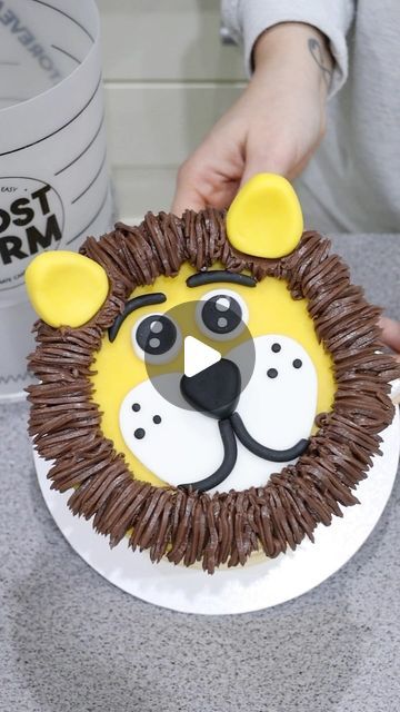 Frost Form® on Instagram: "Cute Little Lion Cake 🦁  Wouldn’t this cake be perfect for a Jungle-themed Birthday or Baby Shower? 🤗  We used Butter Ganache colored with Colourmill   Get the recipe and order Frost Form on www.frostform.com  Video by @loveisbakeable" Lion Smash Cake, Cake Jungle Theme, Lion Birthday Cake, Frost Form, Jungle Theme Cake, Butter Ganache, Jungle Birthday Cakes, Lion Cake, Jungle Theme Cakes