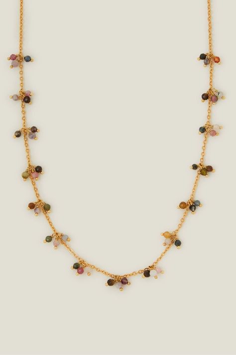 Part of the Z by Accessorize collection. Adorned with clusters of Tourmaline beaded charms on a dainty chain, this necklace is a great accompaniment to low-cut blouses and strappy slip dresses. Plated in 14 carat gold for a luxe, longer-lasting finish. 63% Recycled brass, 32% Stone, 5% Brass. Beaded Charms, Fascinator Headband, Dainty Chain, Tourmaline Beads, Wedding Bridal Jewellery, Waterproof Jewelry, Station Necklace, Girls Sandals, Girls Jewelry