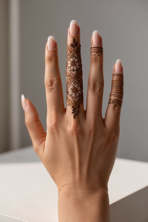 Highlight your style with a delicate lattice-and-floral motif beautifully wrapped around the middle finger, complemented by simple yet elegant bands on the others. This understated henna design strikes the perfect balance between modern chic and classic charm—ideal for festive occasions, bridal events, or an everyday touch of artistry! Minimalist Henna, Fingers Mehndi Design, Fingers Mehndi, Finger Mehndi Designs, Henna Hands, Finger Mehndi, Friends Cartoon, Best Friends Cartoon, The Middle Finger