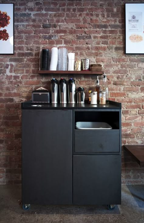 A custom designed condiment bar houses condiments for coffee as well as a bus bin and trash bin. Jane Kim Design Corner Coffee Station, Office Coffee Station, Office Coffee Bar, Diy Coffee Station, Coffee Station Kitchen, Coffee Bar Station, Coffee Area, Diy Coffee Bar, Bar Station