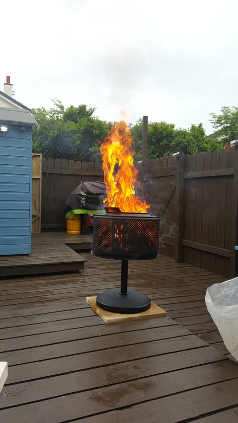 Fire pit, washing machine drum, parasol Base, black bbq paint Washing Machine Drum Fire Pit, Fire Pit Drum, Barbecue Portable, Washing Machine Drum, Metal Fire Pit, Concrete Fire Pits, Back Garden Design, Parasol Base, Bbq Pit