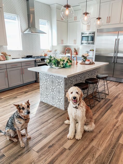 Tiled Island Base | Cement Tile | Cement Tile Island | Copper Kitchen | Modern Kitchen | Two Tone Cabinets | Golden Doodle | Australian Cattle Dog #copperkitchen #tiledislandbase #tileislandbase #cementtile #modernkitchen Kitchen Two Tone, Tiled Island, Tile Island, Kitchen Island Base, Cement Kitchen, Moroccan Kitchen, Metal Cabinets, Two Tone Kitchen Cabinets, Cheap Kitchen Cabinets