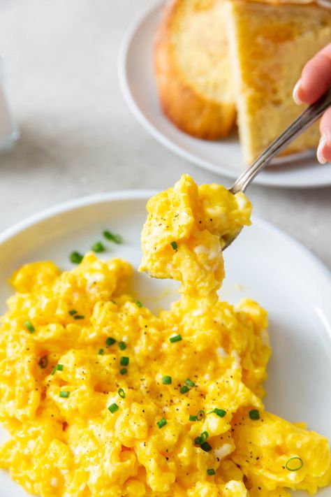 The best Scrambled Eggs Recipe! How to make scrambled eggs that are fluffy, soft and creamy. Make them for a crowd or to serve just one. An easy breakfast idea! Best Scrambled Eggs Recipe, Eggs In Air Fryer, Freeze Eggs, The Best Scrambled Eggs, Egg Restaurant, Egg And Potato, Egg Casseroles, Easy Scrambled Eggs, Sandwich Egg