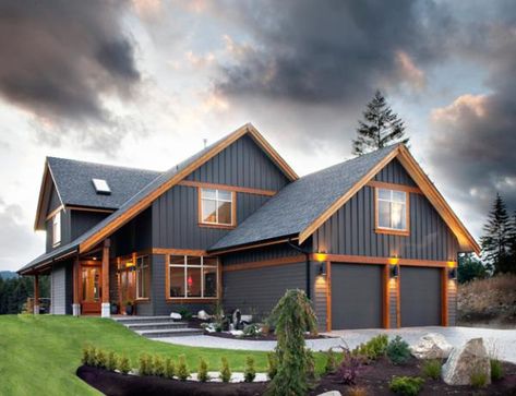 Wood Trim On Exterior Of House, Houses With Wood Trim Exterior, Grey Wood Exterior House, Modern Farmhouse Vinyl Siding, Dark Grey House Exterior Wood Trim, Blue House With Wood Trim, Black House Natural Wood Trim, Dark House Natural Wood Exterior, Wood Trim Windows Exterior