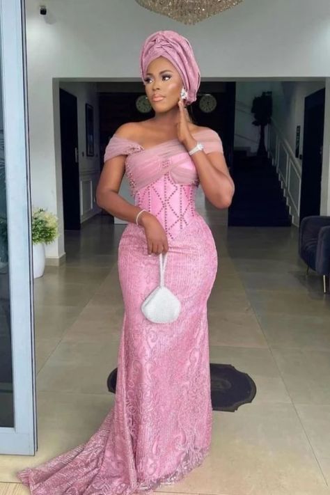 Who is ready to find out what the latest Aso Ebi styles 2023 for ladies look like? What colors and cuts are in trend for these stunning style? How to replicate these chic outfits for a special occasion? If you are, then follow my advice!!Visit our page for more styles. Nigerian Traditional Dresses, Latest Lace Styles, Asoebi Lace Styles, Aso Ebi Lace Styles, Nigeria Wedding, Nigerian Lace Styles Dress, Nigerian Lace Styles, African Lace Styles, Nigerian Fashion