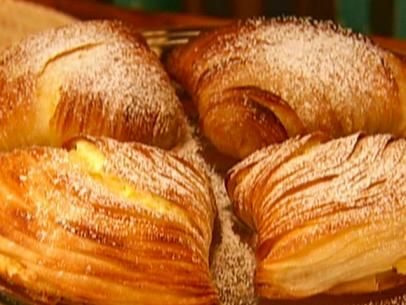 Sfogliatella Recipe, Cinnamon Milk, Oranges And Lemons, Egg Wash, Ricotta Cheese, Confectioners Sugar, Baking Sheets, Serving Platters, Ricotta