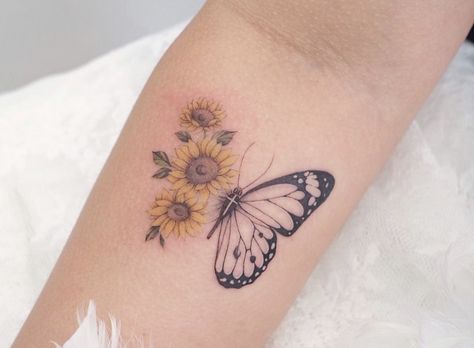 Buterfluffy Sunflower Tattoo, Yellow Rose And Butterfly Tattoo, Sunflower With Angel Wings Tattoo, Sunflower And Butterflies Tattoo, Yellow Butterfly Tattoo Ideas, Half Butterfly Half Sunflower Tattoo, Butterfly Memorial Tattoo Ideas, Sun And Butterfly Tattoo, Sunflower With Butterfly Tattoo