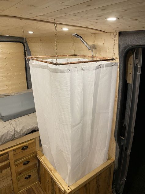 This van was born out of a desire to maximise comfort in a small space. Camper Van Shower, Hidden Shower, Living Off Grid, Caravan Vintage, Quirky Campers, Kombi Motorhome, Kombi Home, Van Conversion Interior, Campervan Life