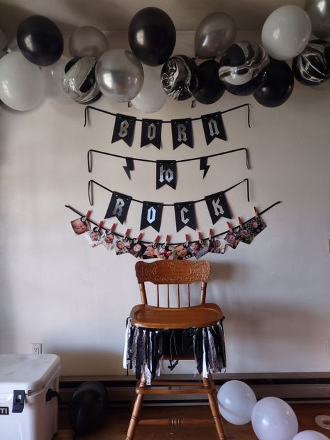 DIY-Dollar Tree balloon arch string, black ribbon, Cricut cut black banner with silver vinyl, 0-12 mo 4x4 photo string, ONE music note cut fabric high chair banner/decoration. Rock And Roll Bday Party Ideas, Rock One Birthday, Born Two Rock Birthday Boy, Another One Bites The Dust 1st Birthday, Rock And Roll First Birthday Party, Born 2 Rock Birthday Party, Born To Rock Birthday Party, Born Two Rock Birthday, One Rocks Birthday