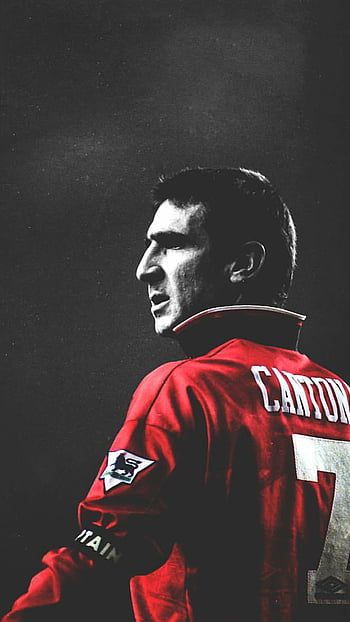 Eric Cantona played for a number of clubs including Leeds United, Manchester United, and the French national team. He was known for his exceptional technical ability, vision, and creativity on the field, and won numerous accolades throughout his career. Cantona's legacy as one of the greatest footballers of all time has endured, and he is also remembered for controversial incidents, including the "kung-fu kick" and his unexpected retirement at the age of 31. Eric Cantona Kick, French National Team, Manchester United Art, Manchester United Old Trafford, Manchester United Images, Football Artwork, Manchester United Team, Eric Cantona, Manchester United Wallpaper