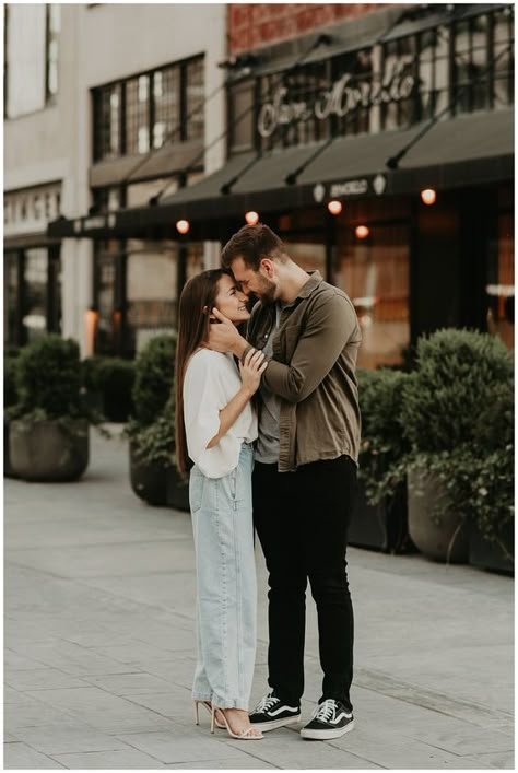 Dress up your engagement photoshoot with this casual yet sophisticated collared work top. Its loose fit offers comfort without compromising on style. #EngagementPhotoshoot #CasualChic Industrial Style Engagement Photos, Detroit Couple Photoshoot, Urban City Couple Photoshoot, Downtown Engagement Photos Outfits, Engagement Pics Downtown, Casual Engagement Pictures City, Old City Engagement Photos, City Prenup Engagement Shoots, Downtown Knoxville Photoshoot