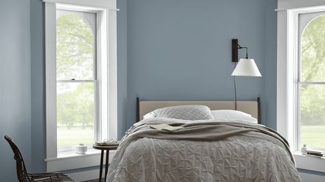 Blue and gray are both calming and soothing colors that are well-loved for their ability to create a relaxing space. But bringing them together create... | 7 Adirondack Blue in the Bedroom Behr Blue Gray Paint Colors, Behr Blue Grey Paint Colors, Behr Blue Paint, Behr Blue Paint Colors, Behr Paint Colors Grey, Soothing Bedroom Colors, Behr Blue, Bedroom Paint Colors Grey, Blue Bedroom Paint