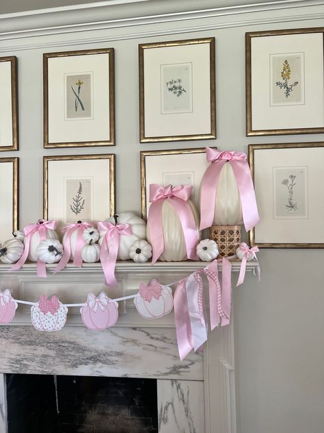 A variety of pink pumpkins with pink bows!! Also comes in blues. Pink Fall Mantle Decor, Pink And Green Fall Decor, Pink And Blue Pumpkins Gender Reveal, Fall Holiday Decor, Coquette Halloween Decor, Pumpkin With Bow, Pink Halloween Room Decor, Girly Fall Aesthetic, Pink Pumpkin Baby Shower Ideas