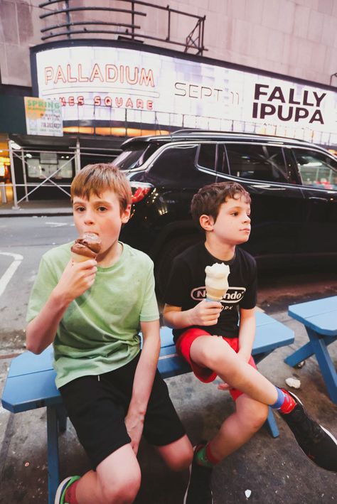 Two kids eating ice cream on a side street off of times square Kids Eating Ice Cream, Nyc Activities, Great Vacation Spots, Trip To Nyc, Nyc With Kids, Eating Ice, City Family, Eating Ice Cream, City Kid