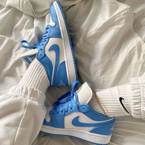 Air Jordan 1 Low UNC Blue White fashion shoes sneakers for women and men. Blue Jordan 1 Low, Unc Jordan 1, Jordan Unc, Nike Tenis, Jordan 1 Unc, White Basketball Shoes, Jordan Shoes Girls, Blue Jordans, Nike Socks