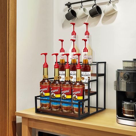 Syrup Rack Coffee Shop, Drink Rack Ideas, Coffee Syrups Display, Self Serve Coffee Station, Coffee Syrup Storage, Coffee Bar Syrup Display, Coffee Syrup Organization, Drink Station Ideas Kitchens, Beverage Station