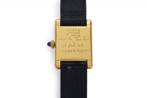 The reverse of Jackie Kennedy’s tank watch showing the inscription. Photo Christie’s The Cartier Watches of First Ladies | The Adventurine Tank Watch, Watch Engraving, Luxury Watch Brands, Cartier Tank, Cartier Watch, Dandy, Luxury Watch, Watch Brands, Vintage Cartier