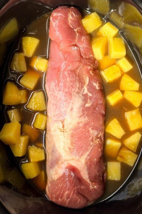 Looking for an easy and delicious dinner idea? This Crockpot Hawaiian Pineapple Pork Tenderloin, with only 3 ingredients and a quick 5-minute prep time, is not only incredibly tasty and tender but also likely to become a favorite! Its versatility in serving options makes it an ideal dish for busy weeknight dinners or laid-back weekend cooking. Hawaiian Pineapple Pork, Pineapple Pork Tenderloin, Tenderloin Crockpot, Pork Tenderloin Crock Pot Recipes, Teriyaki Pork Tenderloin, Bbq Pork Tenderloin, Crockpot Pork Loin, Crockpot Pork Tenderloin, Pork Crockpot Recipes