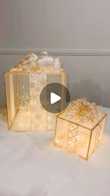 640K views · 39K likes | Kendra Davis on Instagram: "🎁 DIY Light Up Gift Boxes🎁  Hey-hey L♥️VES!!   I  OBSESSED with these light up gift boxes I made 😍😍😍.    ♥️I used a pack of 6 inch wooden dowels for the smaller box, and a pack of 12 inch wooden dowels for the larger box (from the @dollartree ).    ♥️I got a light gold piece of tulle and covered the top and all of the sides of the box…,leaving the bottom open.   ♥️I added gold ribbon to give this box a real “gift” look 🥰  ♥️To finish it off, I put a string of battery operated lights inside each box (that’s why I didn’t put tulle on the bottom).   Let me me know what you think 😊  🎁Follow me for more crafts/DIY’s @my_home_by_kendra_nicole   ♥️Like ♥️Comment ♥️Share   #dollartreediys #diy #crafts #imcrafty #christmasdiys #dollartree Light Up Box, Diy Christmas Lights, Landscaping Simple, Diy Light, Candy Land Christmas Decorations Outdoor, Christmas Float Ideas, Diy Christmas Decorations Easy, Candy Christmas Decorations, Candyland Decorations