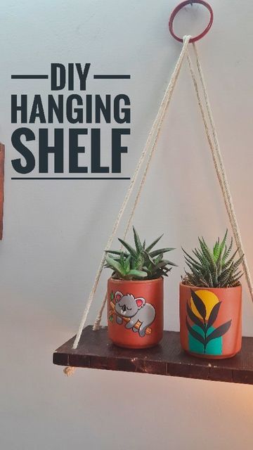 Ghar aur Bageecha | Interior Decorator on Instagram: "I made a hanging shelf with the scrap wood for the super cute planters sent by @saavesiofficial Stained the scrap wood with stainer and coated it with touchwood. Used my old bangle and ropes for hanging it. Used drill machine to make holes in wooden plank. All the materials used are available on any hardware shop. And...and...and.. Are you bored with the plain planter for your beautiful plants?  @saavesiofficial got you covered. This h Wooden Planks Diy Home Decor, Cute Planters, Diy Stool, Hanging Wall Planters, Diy Hanging Shelves, Wooden Plank, Drill Machine, Interior Decorator, Hanging Shelf